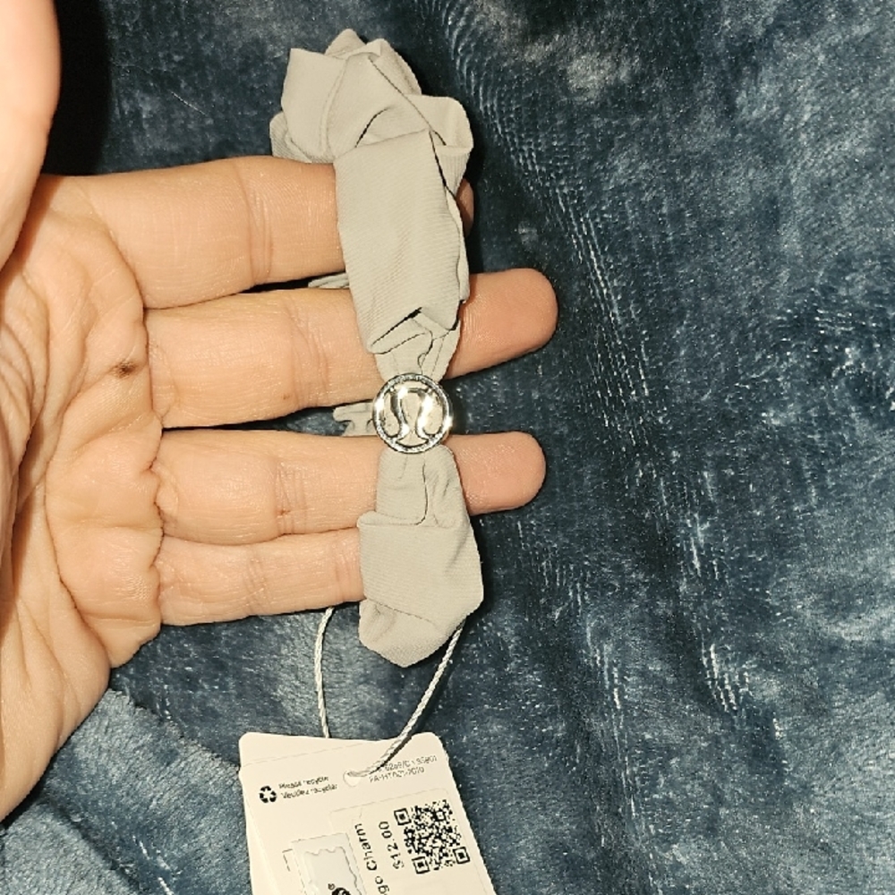 Lululemon Uplifting Scrunchie *Logo Charm. SEAL!! Beautiful! Sold Out